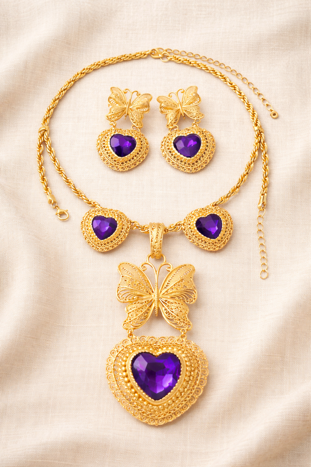 Juego de Collar y Aretes Mariposa con Corazón Violeta
